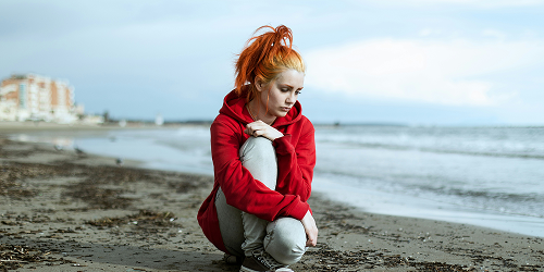 sad woman at the beach